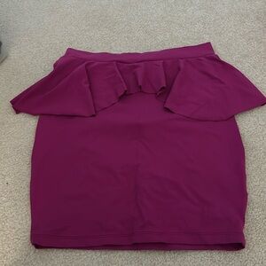 Bebe peplum skirt in fuschia